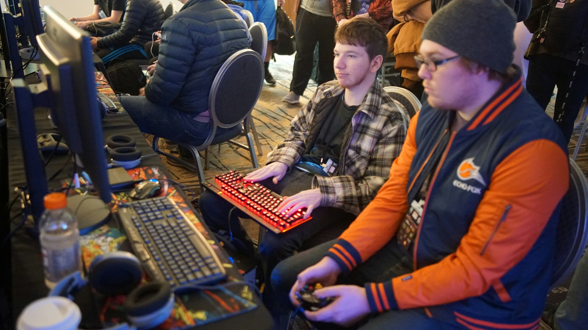 HyperBonusProtocol competitive gaming arena with lit battle stations